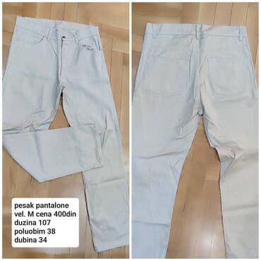 Pesak pantalone – svetlo bež/peščana boja, klasičan kroj. Detalji: -