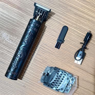 daljinski za klimu: Nov trimer za kosu i bradu. Ima USB punjač za punjivu bateriju i — 6