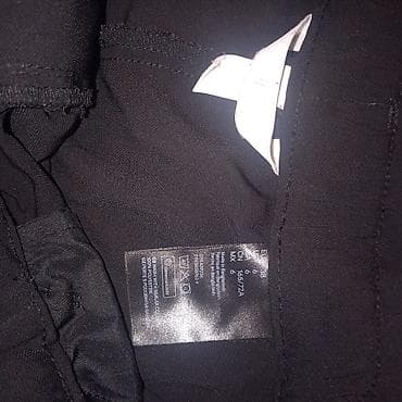 Donji delovi trenerke: Crne ženske šorts bermude, elegantnog kroja visokog struka. - Boja — 2