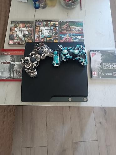 rostilj beli: PlayStation 3 Slim konzola (crna) sa 2 bežična DualShock 3 kontrolera — 3