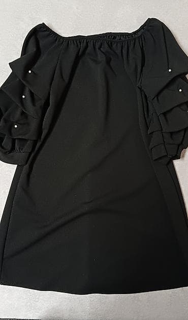 Crna haljine, veličina L.Bez oštećenja.Dužina 72 cm, dužina rukava na lalafo.rs Crna haljine, veličina L.Bez oštećenja.Dužina 72 cm, dužina rukava