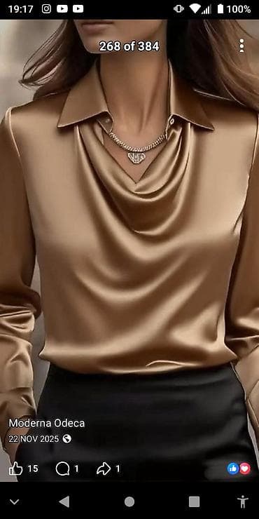 Svilena ženska košulja elegantnog dizajna u boji šampanjca. Model sa