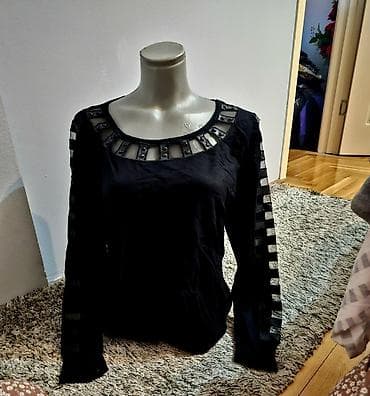 velika mega: Ženska sa prozirnim delovima na rukavima M/L vel — 1