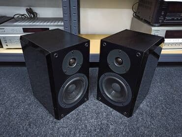 Foto i video kamere: Yamaha NX-E 100 Type: 2 way, 2 driver loudspeaker system Frequency — 6
