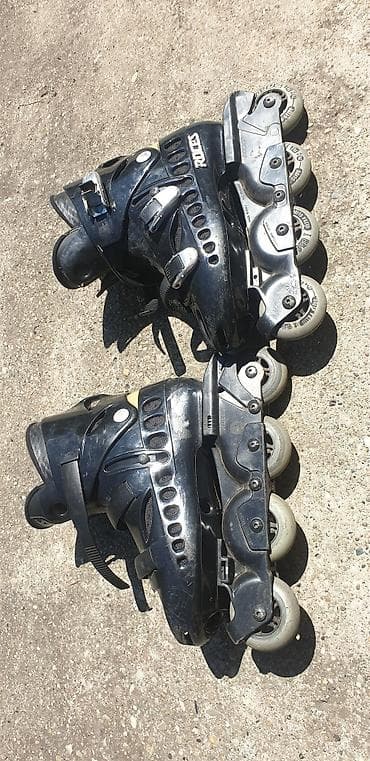 Roleri i rolšue: Agresiv polovni roleri, sa gumenim točkovima, marka rolera je BCN — 2