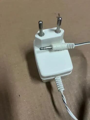 pec na pelet za 70 kvadrata: #1962 Orginalni punjač za NETZGERAT; AC/DC ADAPTER; Model TDUB-63I; — 2