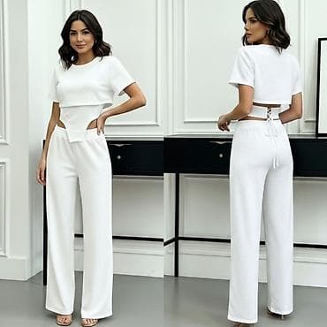 ps kombinezoni 2022: Komplet – top i pantalone sa širokim nogavicama
3000 din — 5