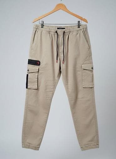 Muške cargo jogger pantalone – bež - Materijal: prijatan, lagan pamuk na lalafo.rs Muške cargo jogger pantalone – bež - Materijal: prijatan, lagan pamuk