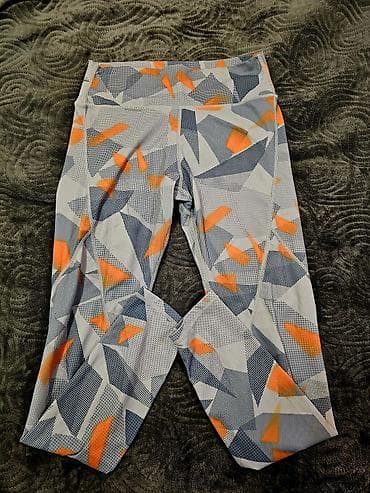 Helanke za sport i rekreaciju sa modernim geometrijskim printom. M