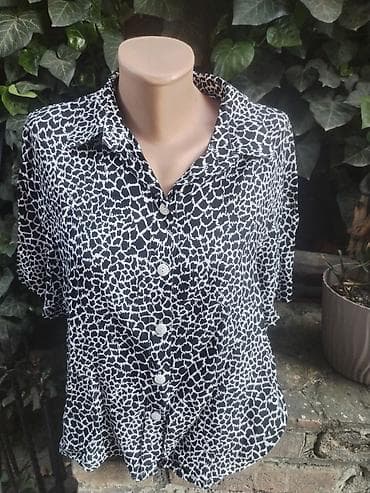 Košulje: Doris kosulja vel L,XL rasprodaja 
Duzina 64
Pazuh po 60 — 1