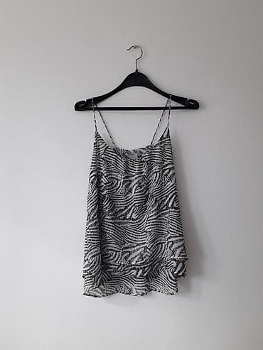 bunda na nemackom: H&M majica
Zebra print
Velicina 34
Zaista kao nova — 3