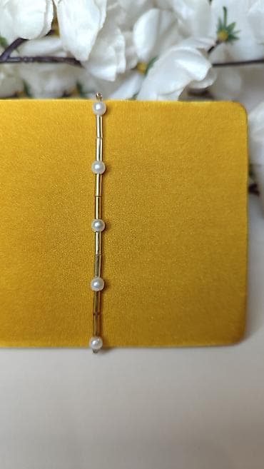 Elegantna narukvica sa biserima - Dizajn: tanka narukvica od na lalafo.rs Elegantna narukvica sa biserima - Dizajn: tanka narukvica od