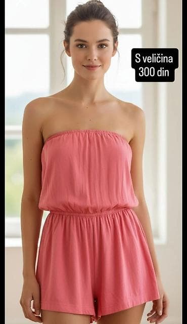 bele torbice: Letnji ženski kombinezon bez naramenica u roze boji. Model sa — 1