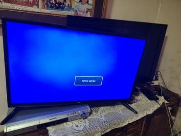 polovni televizori smart: VOX LED televizor, dijagonala oko 32–40 inča (procena po odnosu — 5