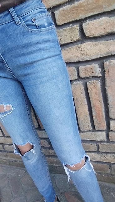 suknjasuknja preko kolena sirina struku cm: Ženske farmerke – model sa poderotinama, svetlo plave boje. - — 2