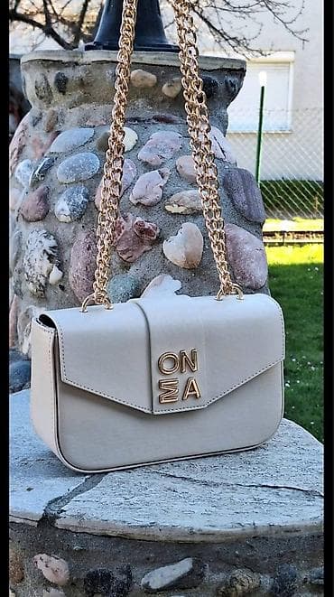 elegantni zenski kompleti sa pantalonama: Elegantna ženska torbica preko ramena – ONΣA - Model: kompaktna — 6