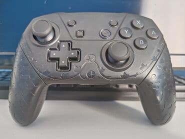 igrice za ps3 cena: Bežični kontroler u crnoj boji, opremljen sa D-padom, dva analogna — 3