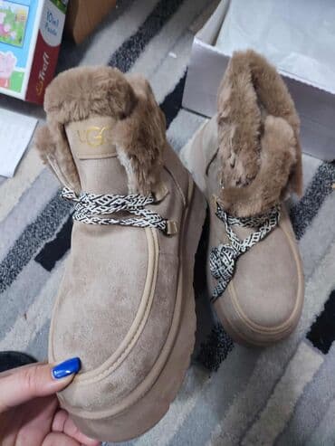 Personal Items: High boots — 2