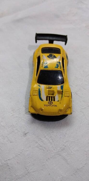 kovanice od 20 dinara sa likom cena: Hot Wheels Toyota Celica Pikes Peak,oko Thailand malo izgreban — 2