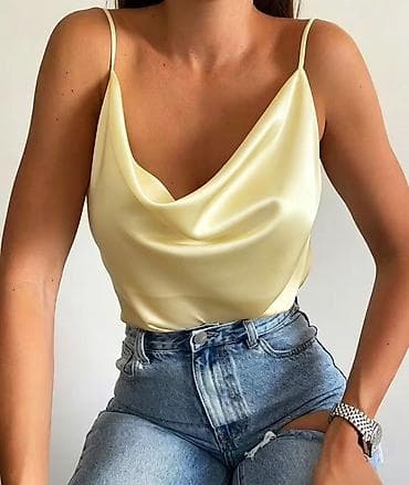 majice bre: Satenski krop top sa tankim bretelama
1550 din
S M L — 6