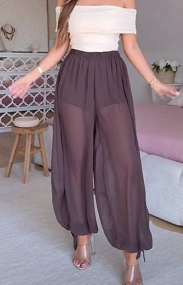 Široke ženske pantalone od laganog, prozračnog šifona. Model sa