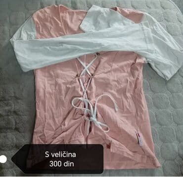 crop top h m: Ženska majica roze boje sa dugim belim rukavima, pogodna za — 1