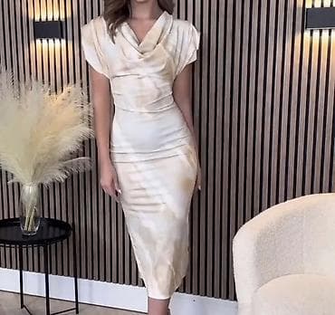 s: Elegantna midi haljina s efektom tie-dye
1550
Din
S M L — 5