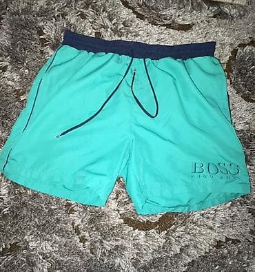 Bermude i šortsevi Hugo Boss, bоја - Tirkizna