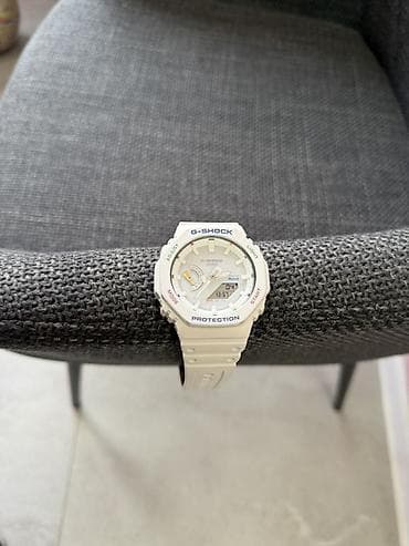 lancici uz vrat: Casio G-Shock analogno‑digitalni sat (bela/ivory) - Serija: G‑SHOCK — 1