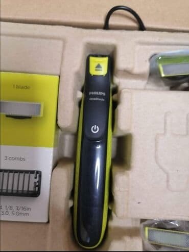 aparati online besplatno: Philips OneBlade trimer u crnoj boji sa žutim akcentima, dizajniran za — 1