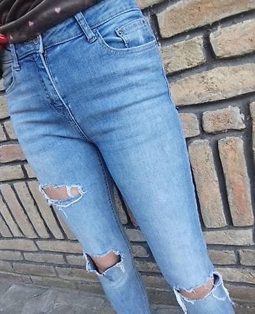 suknjasuknja preko kolena sirina struku cm: Ženske farmerke – model sa poderotinama, svetlo plave boje. - — 1