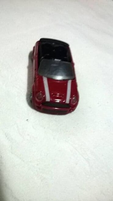 i robot sa prevodom: Burago mini cooper s, china,staklo i platno nisu original — 2