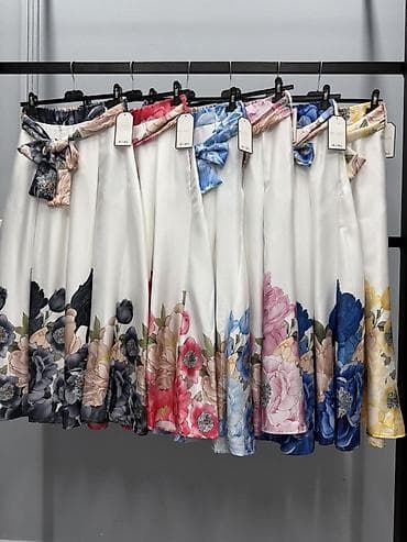 svečane suknje za punije: ✨Svečana midi suknja sa cvetnim dezenom i pojasom
S m L
Cena 2600 din — 3