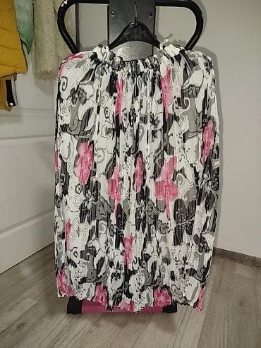 Muška odeća: Plisirana suknja srednje dužine sa elastičnim pojasom. Tkanina je — 1