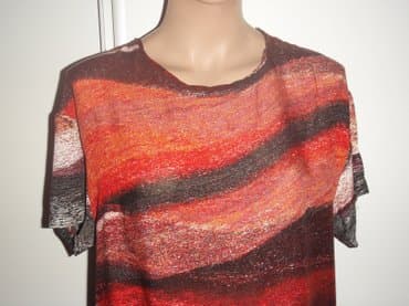 zara bluze: Tunika ZARA 44/46
viskoza,ocuvana
Sirina ramena 52 grudi 58 ledja 76 — 3