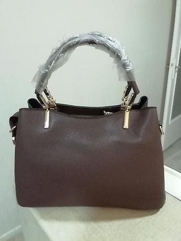 new yorker torbe za plazu: Prelepa braon nova tašna. Izuzetna izrada oko ručki. Dužina 28 cm i — 3