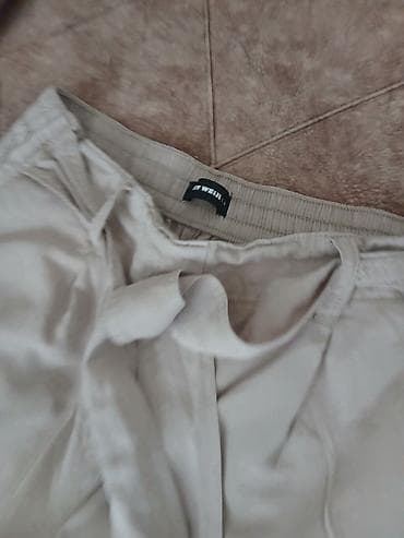 ideal majice: Ženske široke pantalone – bež - Kroj: široke nogavice — 2
