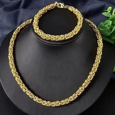 Novčanici: Zlatni set nakita – ogrlica i narukvica, pletena 🛒2,699 din. - — 3