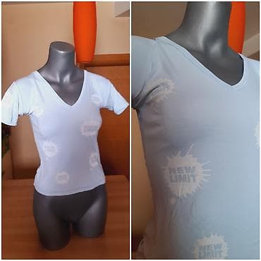 Muška odeća: Ženska majica kratkih rukava, svetloplave boje, sa V-izrezom. Na — 2