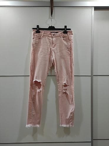 Svetlo roze pantalone Clockhouse super skinny. Veličina 40, poluobim