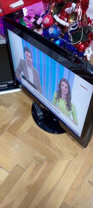 frižider na plin: TV lcd LG 32 inča ili 82 dijagonala ekrana sa daljinskim upravljačem — 2