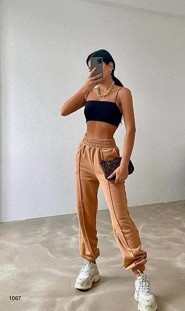 Trenerke donji deo na linije,dubok pojas. Futer,dostupna nezno tuta