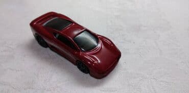 sat na navijanje: Hot Wheels Jaguar 1992,oko Malaysia zafarban na pr.delu — 1