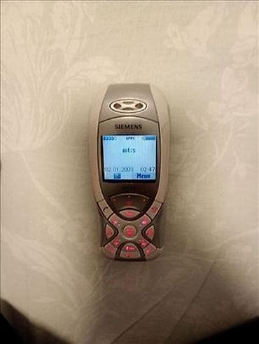 eksterni punjac: Siemens MC60 Telefon bukvalno nov,baterija nova,punjač,radi na svim — 1