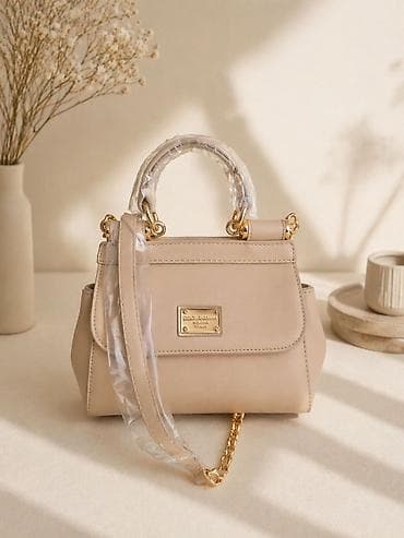 gucci torbica: Elegantna torbicaa u toploj bež nijansi sa zlatnim detaljima. - — 1