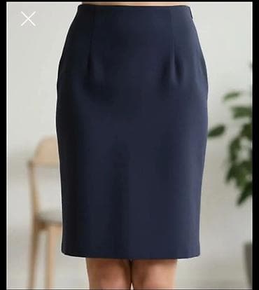 Elegantna ženska suknja olovka kroja u tamnoplavoj boji. Klasična na lalafo.rs Elegantna ženska suknja olovka kroja u tamnoplavoj boji. Klasična