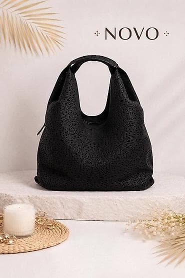 Crna ženska torba – laserski perforiran dezen - Model: mekana hobo