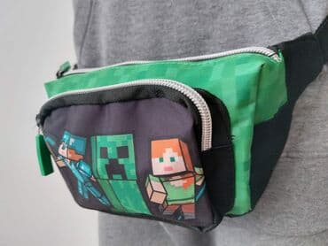 dva i po muskarca sa prevodom na srpski: Torbica Minecraft
Cena 1600 din — 4