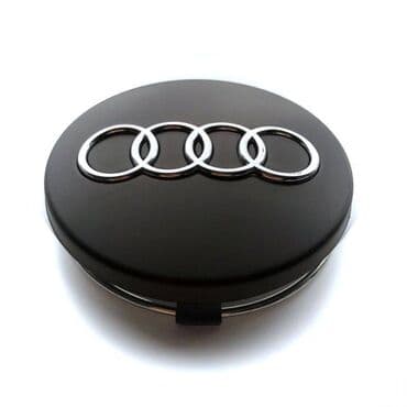 20555 r16 felni: Čepovi za felne AUDI - set 4 komada Čepovi za felne sa logom AUDI - — 4