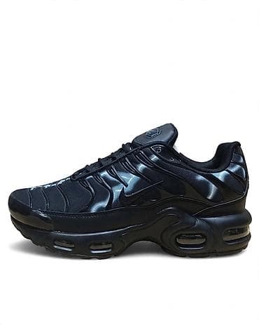 nike air max 1 papuce: Nike patike u crnoj boji, sa prepoznatljivim sportskim dizajnom i — 1